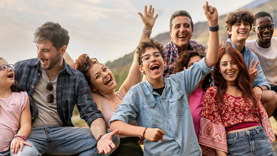 Group of friends young and old, excited about a high interest checking account. 