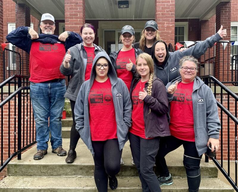 CACL team members are spending time together at a community event. The culture fosters a sense of camaraderie among coworkers, who collaborate with ease.